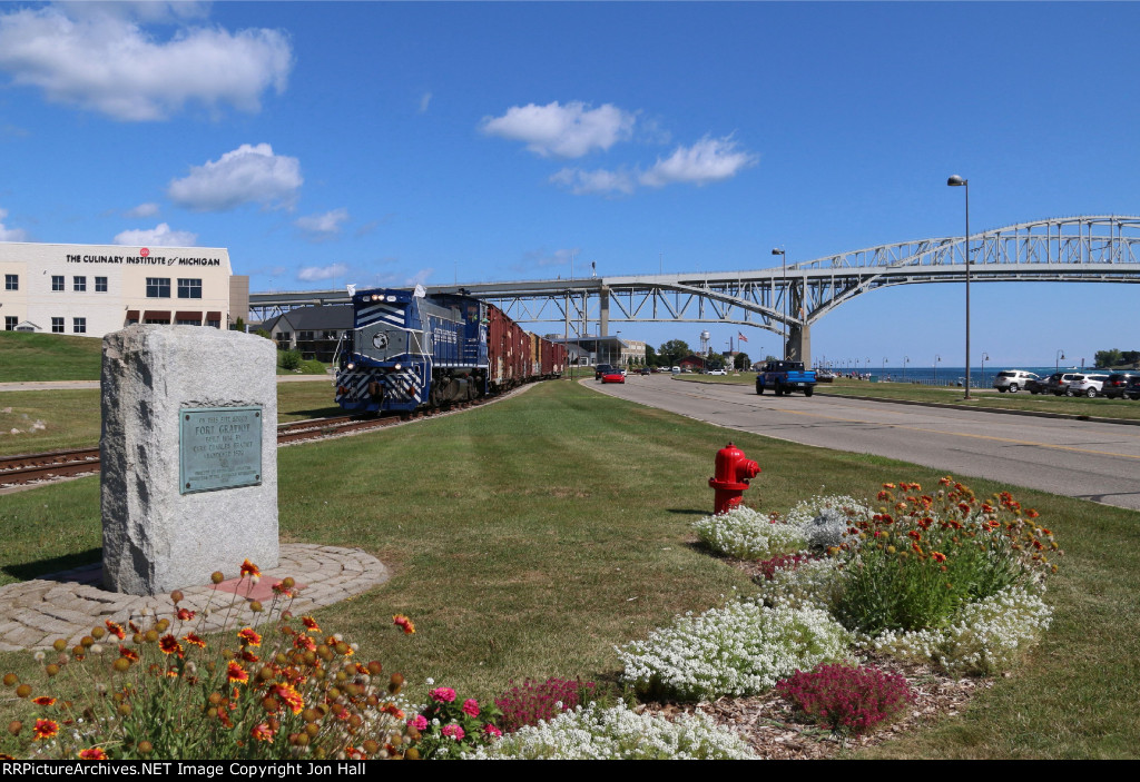 With the Blue Water Bridge looming, 1501 rolls past the location where Fort Gratiot once was